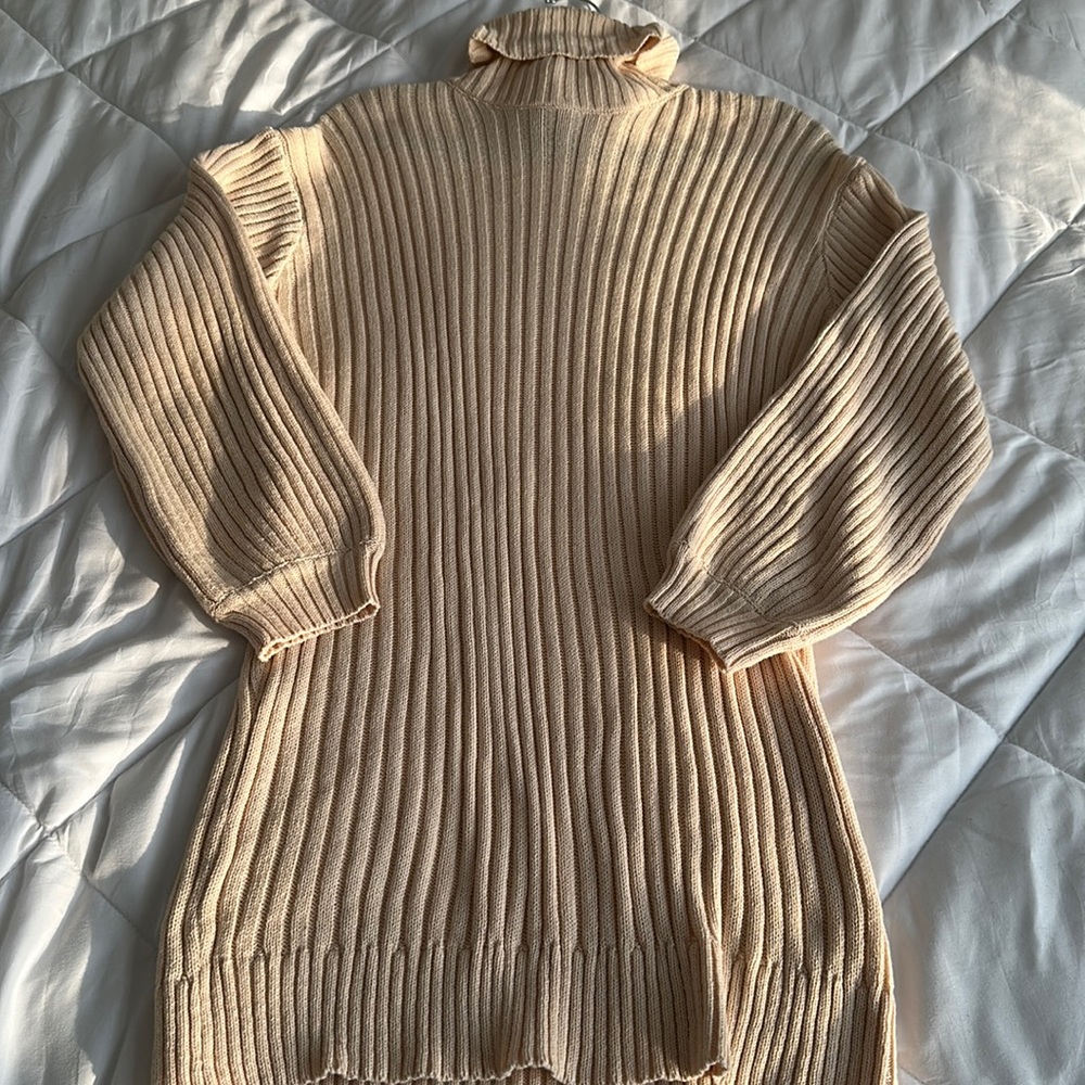 Light peach nude mini sweater dress with balloon sleeves & turtle neck